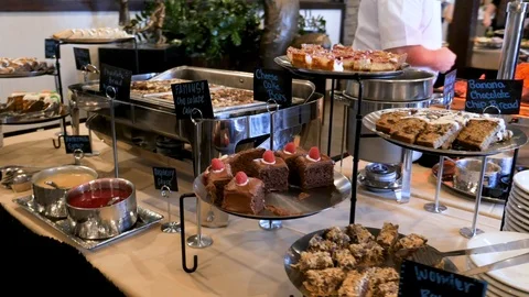Camera turns around desserts at buffet 库存影片 94234796