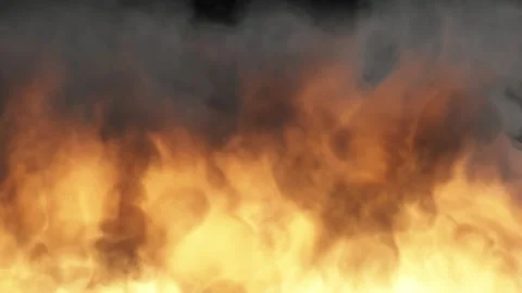 The camera very closely observes a strong flame with smoke across the entire Stock Footage 171695328