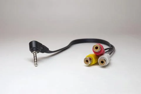 Camera video cable. 3.5mm stereo angled TRRS jack and 3 RCA colorful female.. Stock Photos