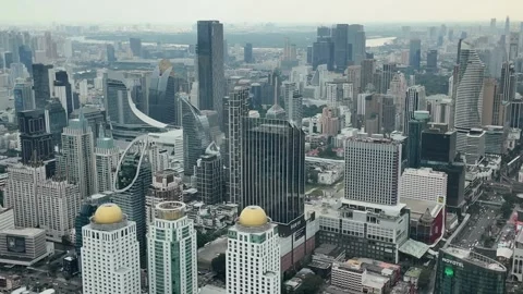 Camera video of dense city skyline under cloudy sky Stock Footage 325789891