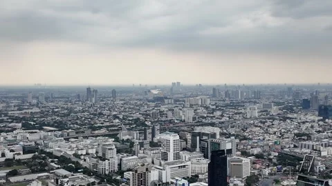 Camera video of dense city skyline under cloudy sky Stock Footage 325789929
