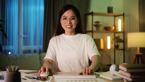 Camera view of amazed woman extremely happy after read message on computer at Stock Footage 251801539