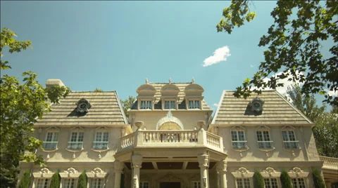 Camera View Drops From Sky, Fixes On Elegant French Provincial Chateau Stock Footage 34494575