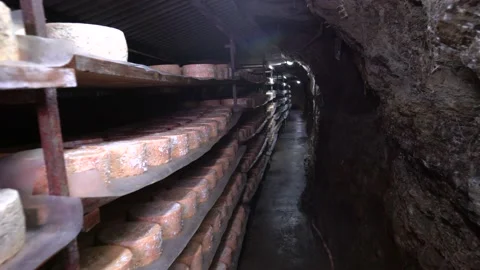 Camera walk through Spanish blue cheese in caves, Cabrales cheese, Asturias,  Stock-Footage 189371250