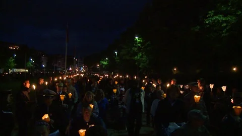 Camera walks with candlelight Marian procession in Lourdes, France Stock Footage 86758464