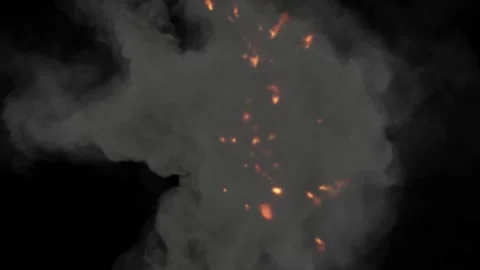 The camera watches as fire particles fly out of the smoke against a black Stock Footage 171306788