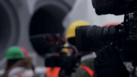 Camera. Work helmet and reflective vest at plant Stock Footage 70939985