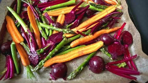 Camera zoom on fresh raw vegetables ready for baking Stock Footage 337038672