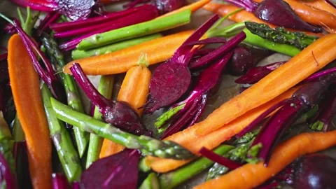 Camera zoom on fresh raw vegetables ready for baking Vidéo 337038703