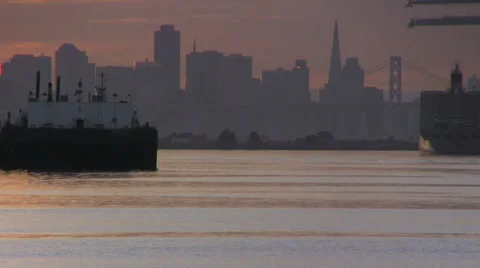 Camera zoom out from looking at the San Francisco shoreline to Oakland estuary Stock Footage 46942188