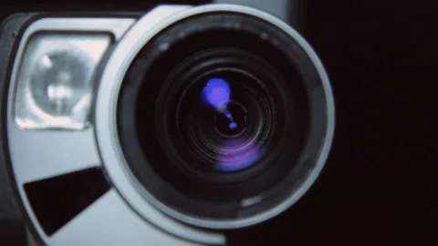 Camera zoom. Taking a close-up video cameras, increasing or decreasing scale. Video stock 115111012