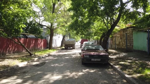 The camera zooms in and around an old, rusty, wrecked Audi car. Video stock 168419782