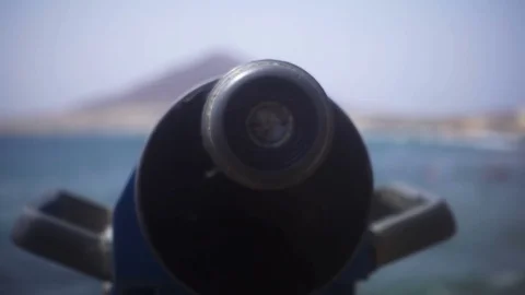 The camera zooms in binoculars Stock Footage 71525027