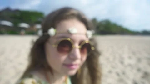 Camera Zooms In to Woman's Face in a Round Sunglasses. Slow Motion Stock Footage 67216546