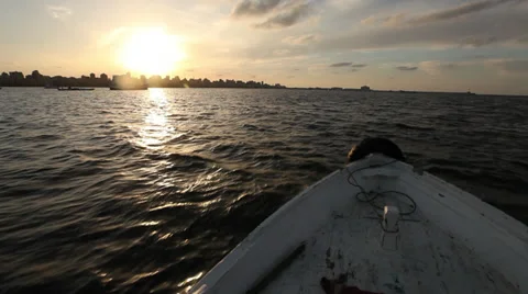 Cameraboat at sunset in Alexandria, Egypt Stock Footage 34688850