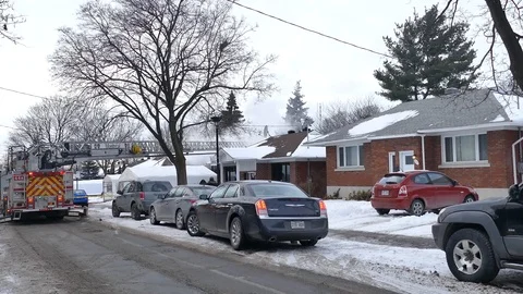 Cameraman arriving at house fire Stock Footage 103301262