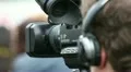 Cameraman with camera (close up) HD Footage