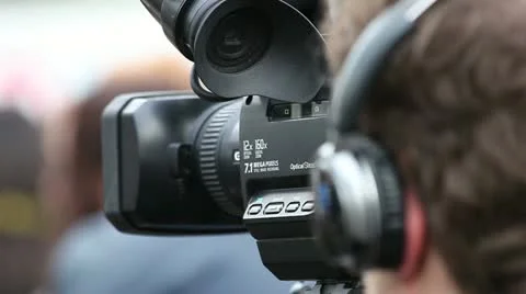 Cameraman with camera (close up) Video stock 11060492