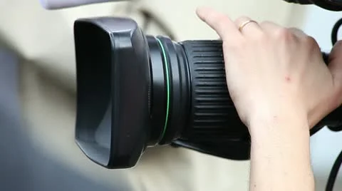 Cameraman with camera (close up) Stock Footage 11060651