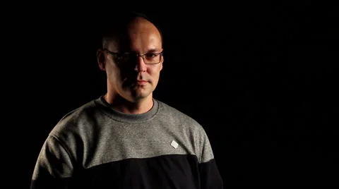 Cameraman with the camera in a dark room Video stock 57256035