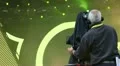 Cameraman with camera on stage at concert HD Footage