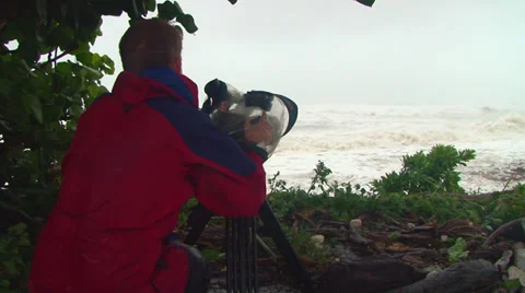 Cameraman films storm Stock Footage 30563346