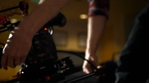 Cameraman operating a video camera on video production. Stock Footage 99426632