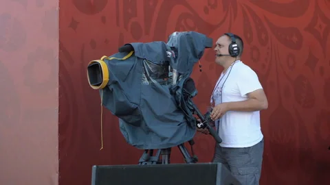 Cameraman shoots video reportage Stock Footage 91574490