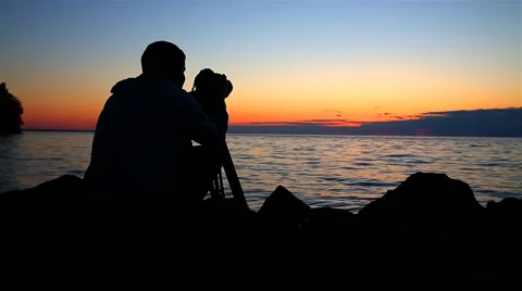 Cameraman at sunset Stock Footage 57729987