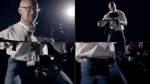 Cameraman is testing modern steadicam in studio, professional equipment for Vídeos de archivo 128288694