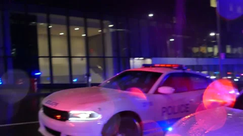 Cameraman walking through tribute paid by police Stock Footage 138564507