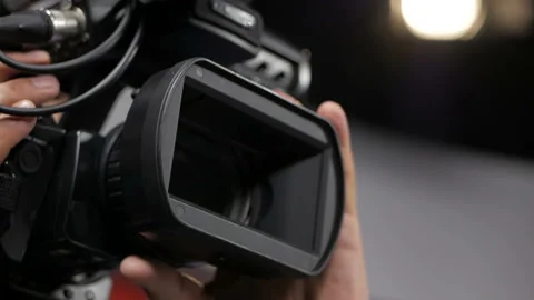 The cameraman is working behind the camera. Stock-Footage 94815866