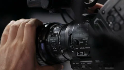 The cameraman is working behind the camera. Stock-Footage 94816003