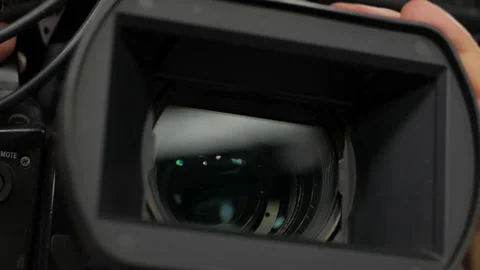 The cameraman is working behind the camera. Stock Footage 94816927