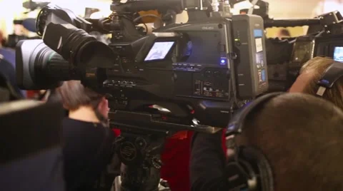 Cameramen shoot interviews after media preview of Boris Godunov Stock Footage