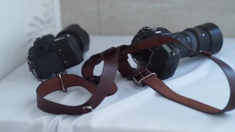 Cameras with leather straps Stock Footage 159882004