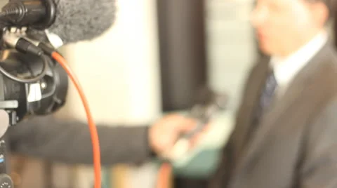 Cameras Man Interview press media handheld camera  Stock Footage 65064778