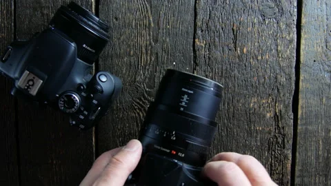 Cameras on wooden background Stock Footage 106939436