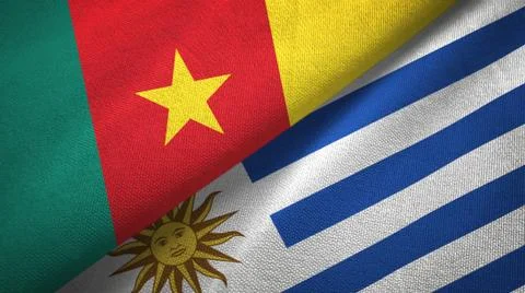 Cameroon and Uruguay two flags textile cloth, fabric texture Stock Illustration