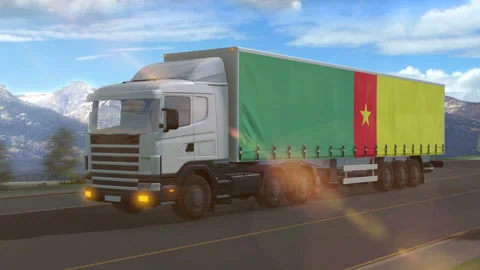 Cameroon flag shown on the side of a large truck Stock Footage 122097060