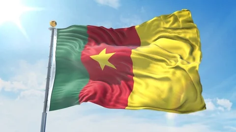 Cameroon flag waving in the wind against deep blue sky. National theme. Stock Footage 123981922