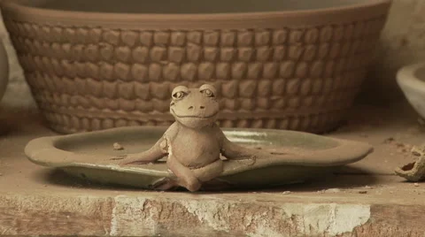 Cameroon Pottery, close up clay frog Stock Footage 64081558