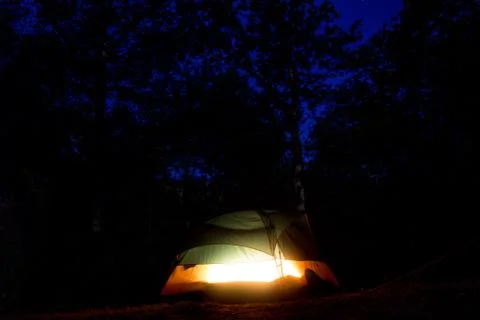 Camoing with a glowing tent Stock Photos