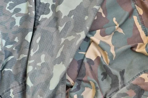Camouflage background texture as backdrop for army and military design projec 写真素材