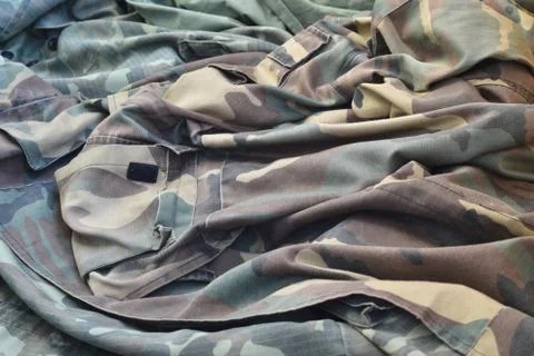 Camouflage background texture as backdrop for army and military design projec 写真素材