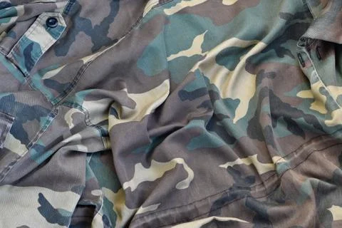 Camouflage background texture as backdrop for army and military design projec 写真素材