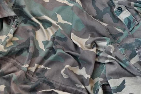 Camouflage background texture as backdrop for army and military design projec Stock Photos