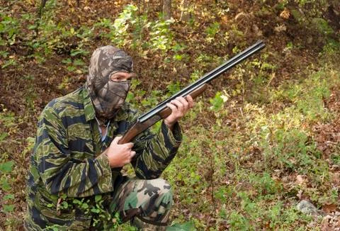 Camouflage hunter Stock-Fotos