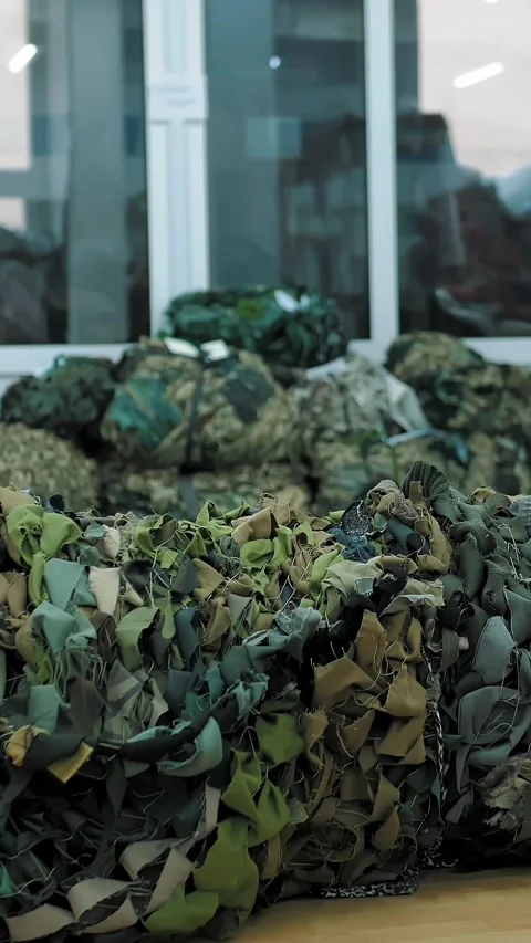 Camouflage net. military. netting. protective camouflage nets, made of green Stock Footage 318593953