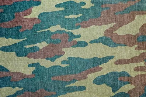Camouflage pattern with rough realistic fabric texture. Military theme back.. Stock Photos